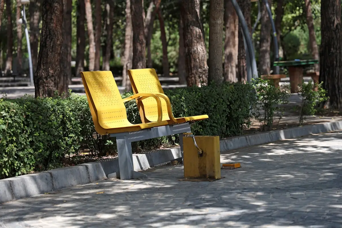 two people sitting in front of fireplace
